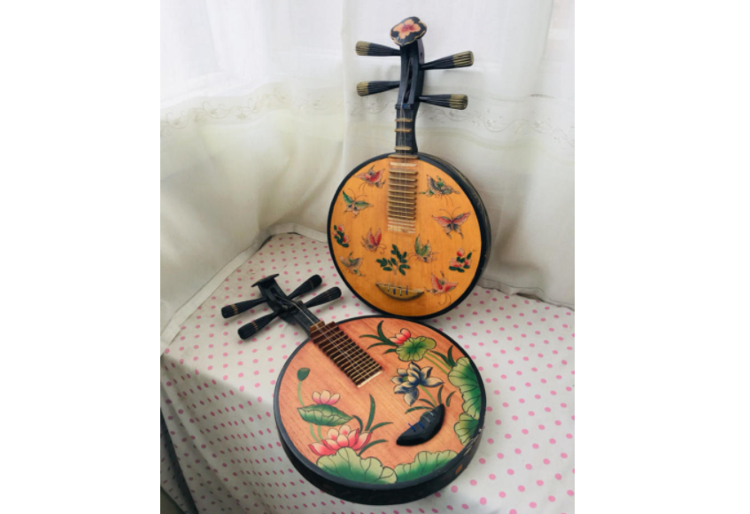 怎么才能把中阮弹好 中阮与月琴的区别 怎么才能把中阮弹好 中阮与月琴的区别